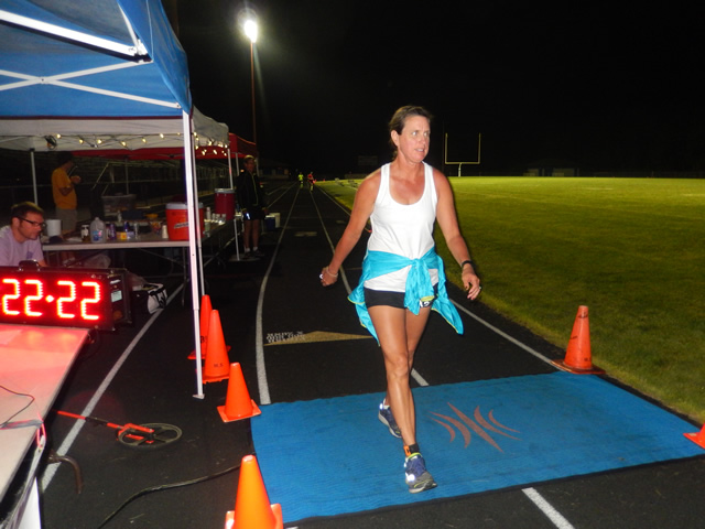 3:30 am... with runners orbiting the track at wildly varying speeds.
