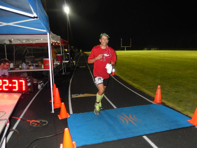 3:30 am... with runners orbiting the track at wildly varying speeds.