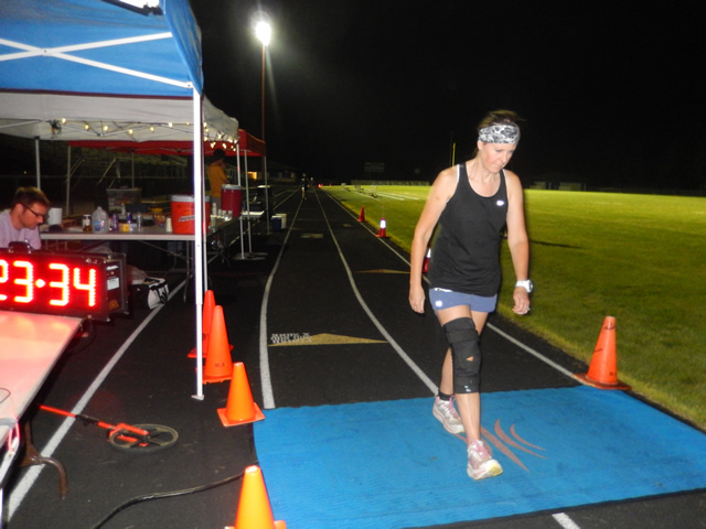3:30 am... with runners orbiting the track at wildly varying speeds.
