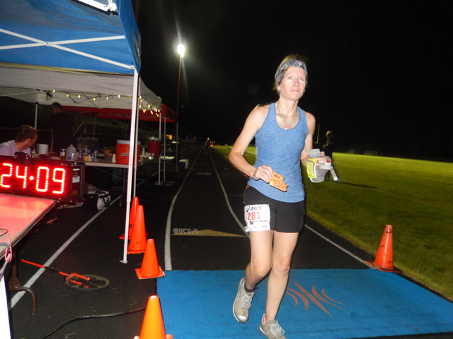 3:30 am... with runners orbiting the track at wildly varying speeds.