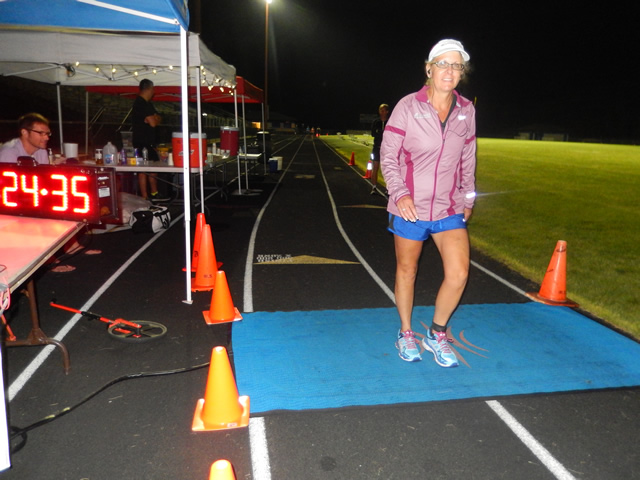 3:30 am... with runners orbiting the track at wildly varying speeds.