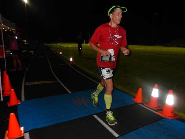 3:30 am... with runners orbiting the track at wildly varying speeds.