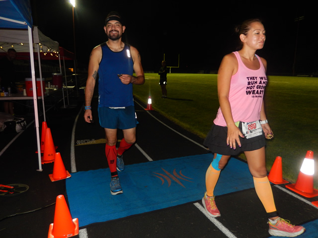 3:30 am... with runners orbiting the track at wildly varying speeds.