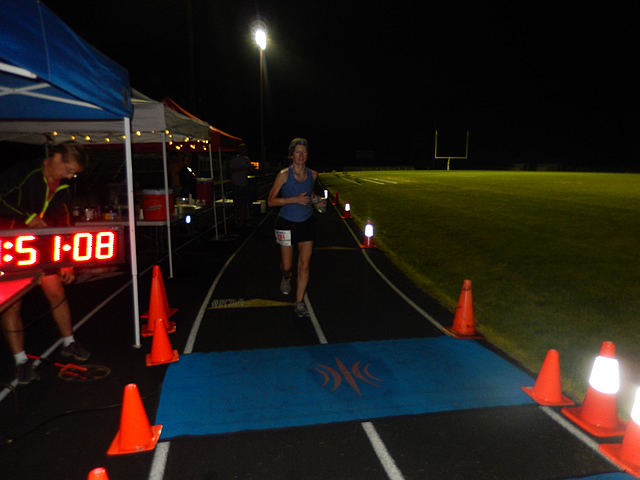 3:50 am... with runners orbiting the track at wildly varying speeds.