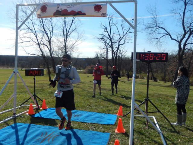 Permian Fall 50-Km runners make their halfway aid station at Pioneer Woods
