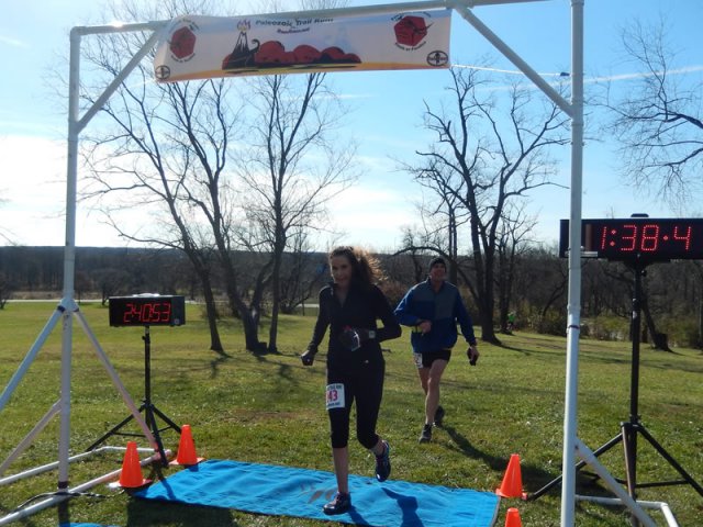 Permian Fall 50-Km runners make their halfway aid station at Pioneer Woods