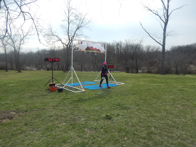 Kimmie Brown, veteran of two past Paleozoic Trail Runs, crosses the finish line of Silurian Spring!