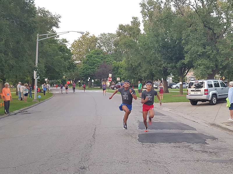 Racing to a 5-Km First Place Photo Finish... Jeremy Bekkouche and Jaime Marcos!