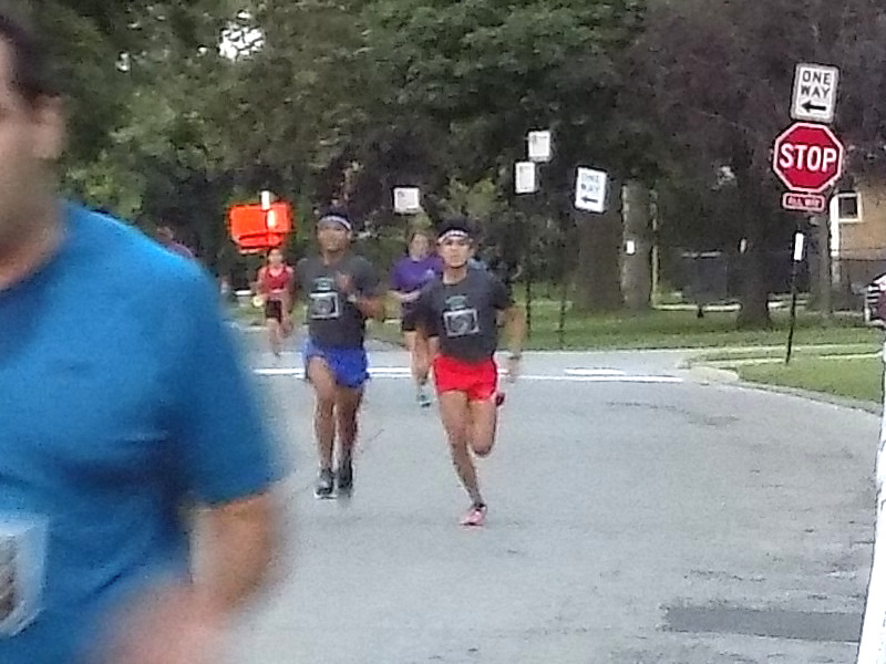 Racing to a 5-Km First Place Photo Finish... Jeremy Bekkouche and Jaime Marcos!